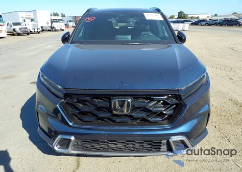 2024 Honda Cr-V Hybrid Sport Touring z USA, uszkodzony, nr VIN 5J6RS6H9XRL009558